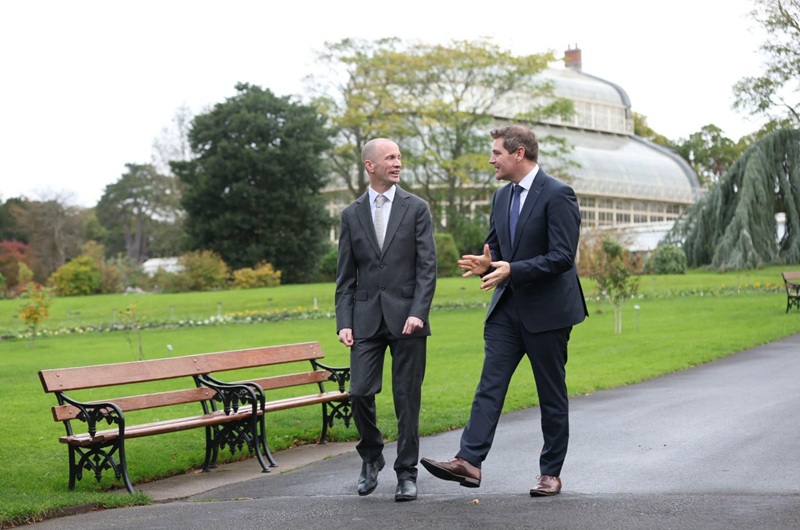 CCPC Chair Brian McHugh walking with Minister Peter Burke TD in the National Botanic Gardens in Dublin.