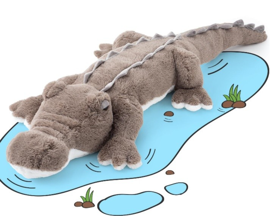 Giant Crocodile Plush Toy Image of a Giant Crocodile Plush Toy XXL that was sold on Amazon. The plush is grey with a white belly, and the image shows the plush toy on an animated pond.