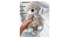 Breathing Otter plush toy - 2 Image shows grey Breathing Otter plush toy