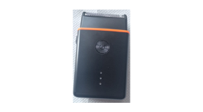 Gertzy Shaver sold on the TEMU platform A black shaver with an orange rim near the shaver head.