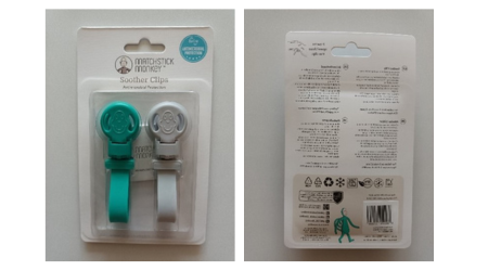 Matchstick Monkey Soother Clips Two Matchmaker Soother clips in blue and grey, as well as the packaging for the product.