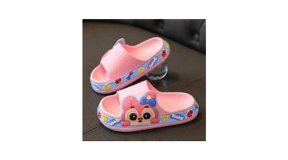 outdoor beach sandals Image shows children's outdoor beach sandals in pink with a dog printed on the side and various designs printed around the sandal.