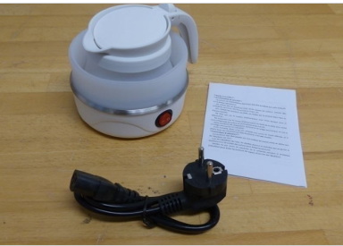 Travel Electric Kettle An image of a white travel kettle, plug with lead and a product document.